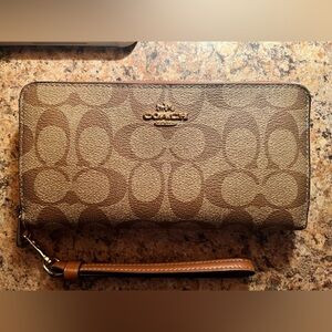 Coach Monogram Canvas Wristlet in Brown and Tan
